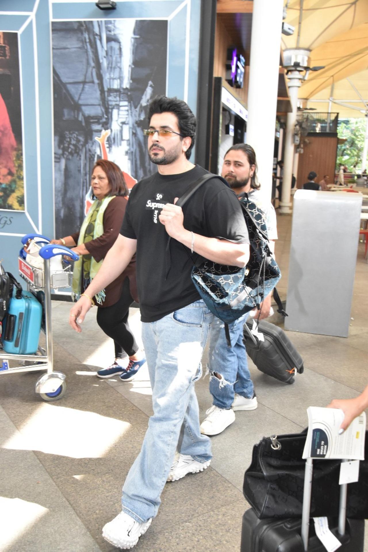 Actor Sunny Singh looked dapper as he left the airport wearing a loose, ripped pair of trousers and a black t-shirt